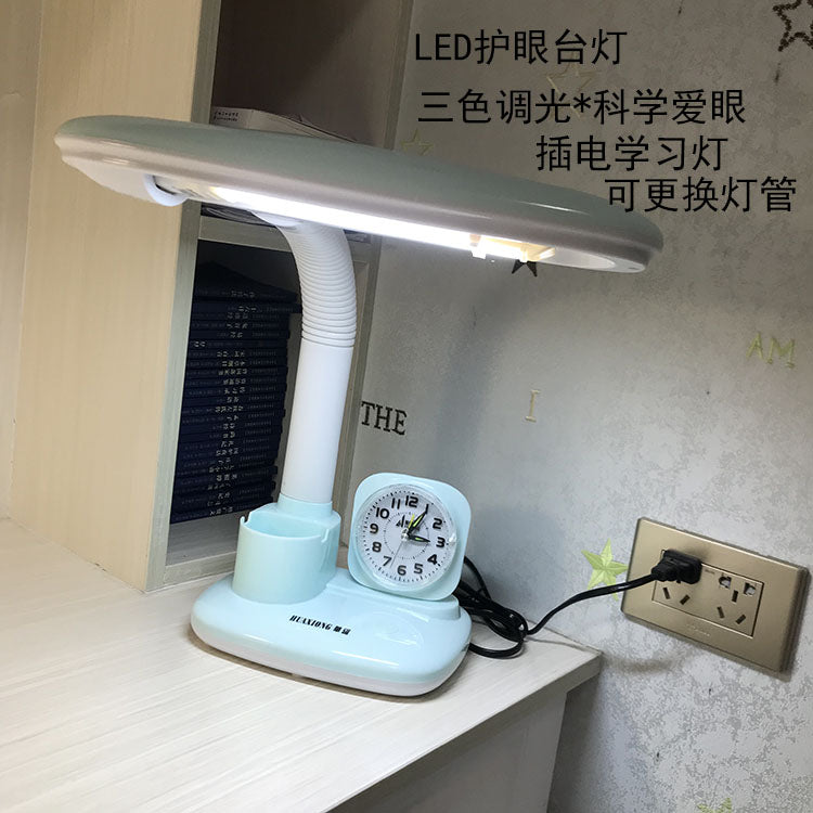华雄护眼台灯儿童学习书桌写字宿舍卧室床头阅读带闹钟夜灯三色灯