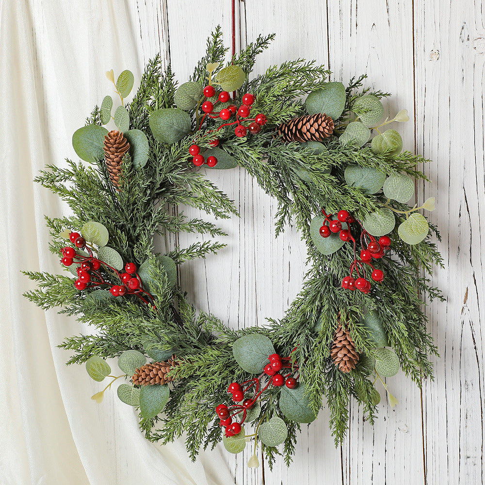 Christmas Wreath with Red Berries, Pine Cones, and Pine Needles