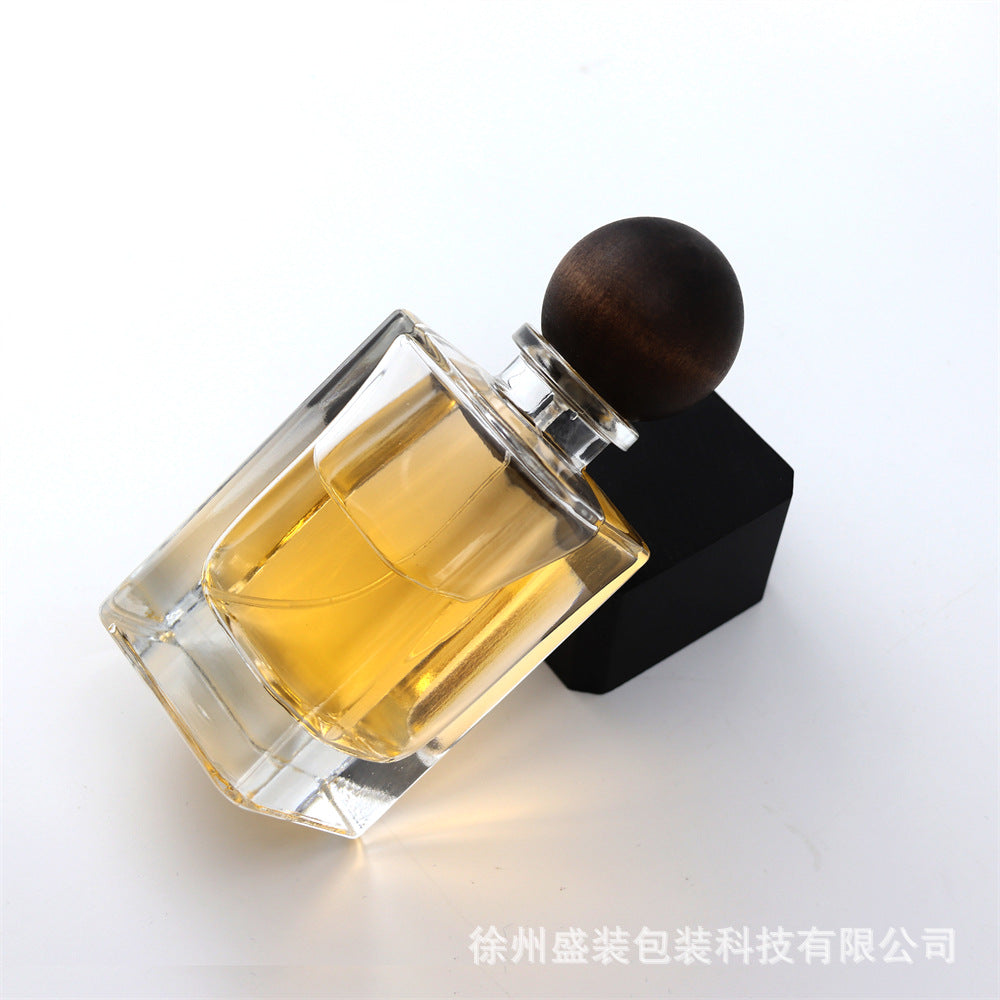 Refillable Clear Glass Perfume Spray Bottle with Wood Ball Cap