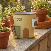 Distressed Vintage Finish Castle Planter Painted Door and Window Details Decorative Castle Pot Drainage Hole Iron Planter Pot Tapered Body