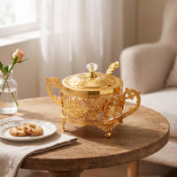 Ornate Condiment Jar with Spoon Gold-Tone Sugar Bowl with Lid Vintage Glass Condiment Pot with Metal Frame Elegant for Hosts