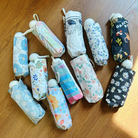 Cross-border 50% Off Floral Black Glue Folding Sunscreen Umbrella UV Protection Sunshade Rain Umbrella Portable Wholesale
