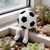 Stress Relief Sitting Soccer Ball Figurine Articulated Legs Desktop Soccer Decor Creative Design Football Character Ornament Sports Aesthetic for Children, Office, Car Dashboard, Bookshelf