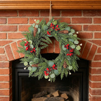 Christmas Wreath with Red Berries, Pine Cones, and Pine Needles