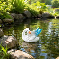 miniature swan figurines