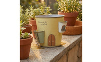 Distressed Vintage Finish Castle Planter Painted Door and Window Details Decorative Castle Pot Drainage Hole Iron Planter Pot Tapered Body