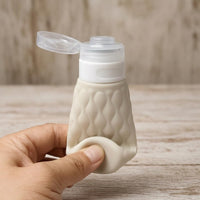 Travel Squeeze Silicone Bottles for Lotions and Cosmetics - Refillable Portable Containers