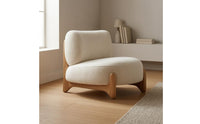 Cushioned Upholstered Lounge Chair Textured Textile Sleek Outline Lounge Chair Rounded Modern Single Sofa Solid Base
