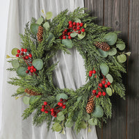 Christmas Wreath with Red Berries, Pine Cones, and Pine Needles