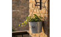 Distressed White Hanging Flower Pot Bird Motif Iron Flower Pot Rope Handle Metal Bucket Planter Printed Text