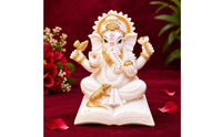 Translucent Elephant-Headed Deity Statue Frosted Seated Deity Figurine Gold-Toned Book Base Statue Molded Detailing