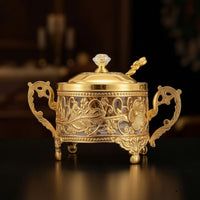 Ornate Condiment Jar with Spoon Gold-Tone Sugar Bowl with Lid Vintage Glass Condiment Pot with Metal Frame Elegant for Hosts