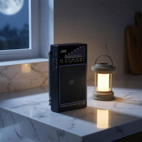 Telescopic Antenna AM AM and Frequency Modulation Shortwave Radio Display Scale Pocket Radio Side Controls Broadcast Receiver Rectangular Body