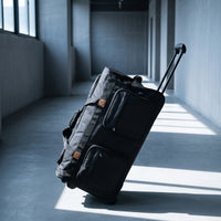 Wheeled Duffel Bag Large Capacity Rolling Travel Bag Multi Portable Travel Duffel with Wheels for Journeyers, Athletes, Road Trips, Training