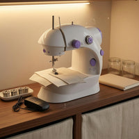 Compact Desktop Sewing Machine Foot Pedal Electric Sewing Machine White and Violet Adjustable Dials