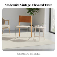 Upholstered Chair with a Curved Backrest Modernist Inspired Dining Room Furniture Padded Seat Ergonomic Design for Homeowners