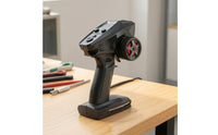 Replacement RC Transmitter with Steering Wheel Dual-Rate Adjustment Pistol Grip Transmitter Ergonomic Pistol Grip Controller Textured for Hobbyists, Racing Practice, Bench Setup