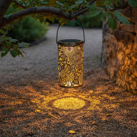 Weather Resistant Hollow Metal Solar Lantern Portable Cylindrical Cutout Lantern Flower Pattern Solar Lamp for Tabletop