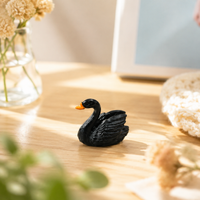 miniature swan figurines