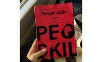 Interpersonal Abilities Book Bold Lettering Red Paperback Book Black Typography Learning Aid