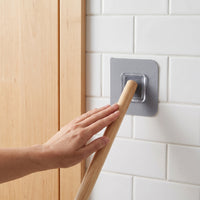 Wall-Mounted Mop and Broom Holder with Strong Adhesive Hooks for Bathroom and Kitchen Organization
