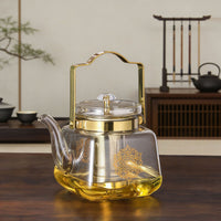 Glass Teapot with Infuser Stovetop Safe Heat Resistant Golden Accents for Home