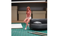 Highly Detailed Woman in Shorts Figure Lifelike Design Sitting Woman Figurine Resin Material Painted Female Miniature for Miniature Scene Builders, Hobbyists, Dioramas, Desktop Decoration