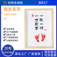 Hollow Photo Frame with Handprint and Footprint Display for Baby's First Birthday, Full Moon, and Hundred Days Celebration