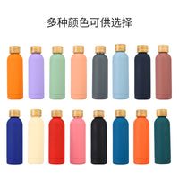 Stainless Steel Insulated Water Bottle with Bamboo Lid and Handle, Portable for Outdoor Sports