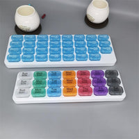 Portable 31-Compartment Pill Organizer with Individual Daily Storage, Transparent