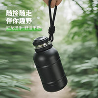 Insulated Water Bottle with Handle - Large Capacity Portable Thermos for Students & Office