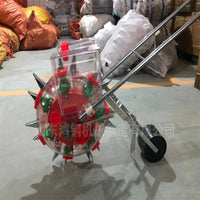 Hand-Pushed Roller Seeder for Small Grains and Vegetables