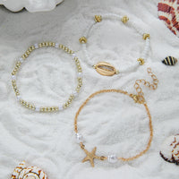 Fashion Ocean Style Alloy Shell Starfish Pendant Pearl Waterproof Waxed Cord Braided Elastic Women's Bracelet 3-Piece Set