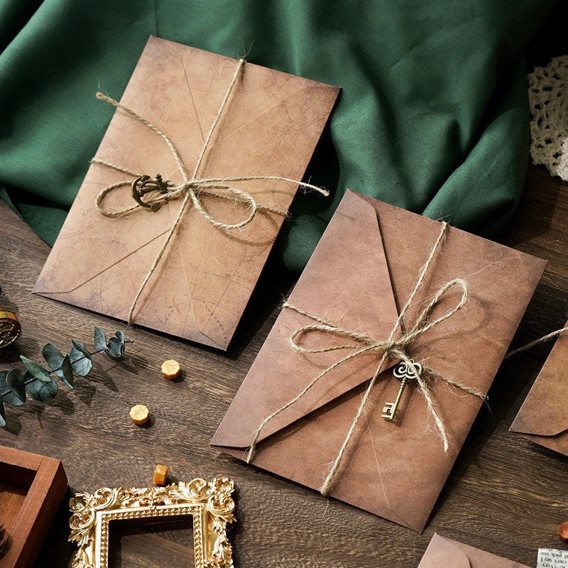 Vintage Kraft Paper Letter Set with Envelope, Twine, and Metal Charm for Romantic Occasions