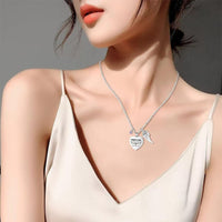 Cremation Urn Necklace with Heart Pendant, Birthstone, and Angel Wing for Ashes, Hair, or Remains