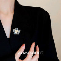 Elegant Camellia Pearl Brooch with Enamel Flower Design for Suits and Dresses