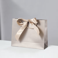 Gift Packaging Paper Bags with Bow Tie Handles, Customizable Logo Shopping Bags