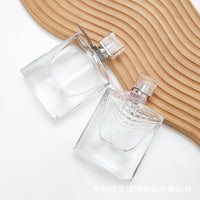 Refillable Flat Square Perfume Atomizer Bottle with Press Spray Pump for Essential Oils and Cosmetics