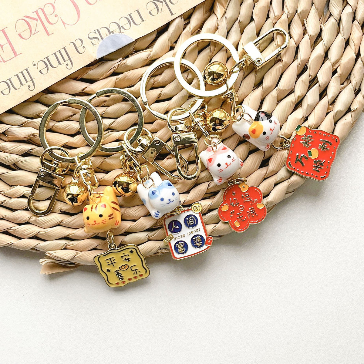 Lucky Cat Bell Keychain Bag Charm - Ceramic Maneki-Neko with Metal Accents