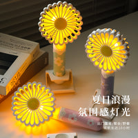 New Daisy Handheld Fan with LED Light, 3-Speed USB Rechargeable Portable Desk Fan with Stand