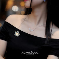 Elegant Camellia Pearl Brooch with Enamel Flower Design for Suits and Dresses