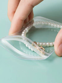 Jewelry Storage Book with Anti-Oxidation Bags for Earrings, Rings, Necklaces, and Bracelets