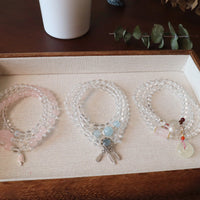 Natural Rose Quartz and White Crystal Triple-Wrap Bracelet with Peace Buckle Charm