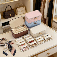 Large Rectangular Jewelry Organizer Box with Portable Pouches, Waterproof Leather Finish, Compartments for Necklaces and Earrings