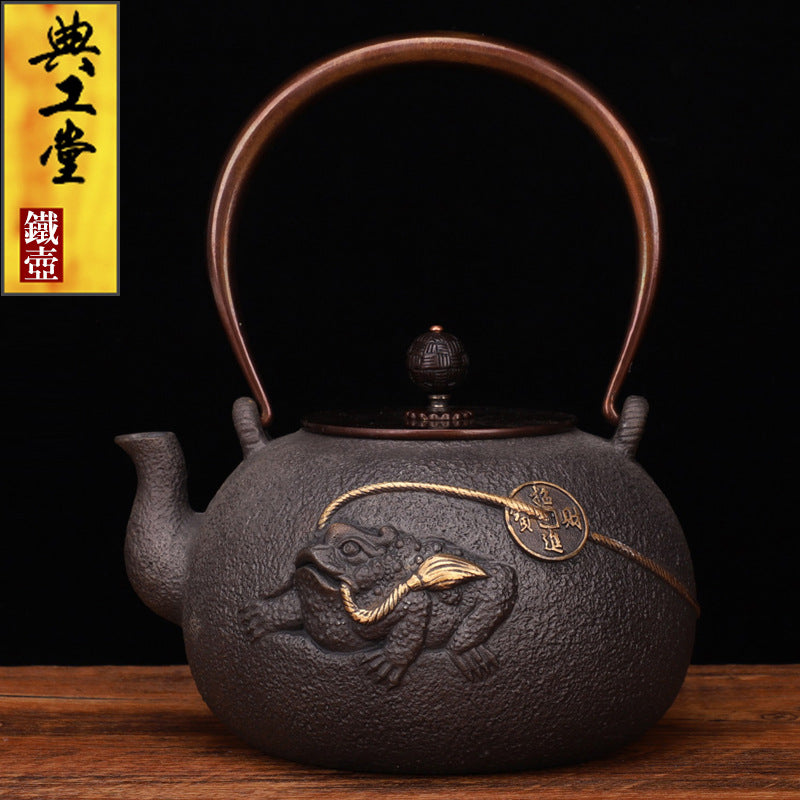 Japanese Cast Iron Teapot with Gilded Toad Design, Uncoated Interior, Copper Handle, 1.2L
