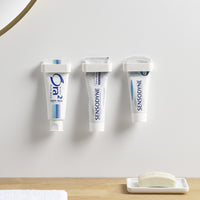 Minimalist Punch-Free Bathroom Wall-Mounted Toothpaste and Facial Cleanser Holder Clip