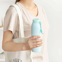 Double-Walled Glass and Plastic Insulated Portable Travel Mug with Anti-Scald Design for Students