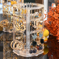 Rotating Dustproof Jewelry Organizer with Multiple Tiers for Rings, Earrings, and Necklaces