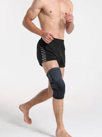 Compression Knee Brace with Pressure Strap for Sports, Running, Cycling, and Fitness