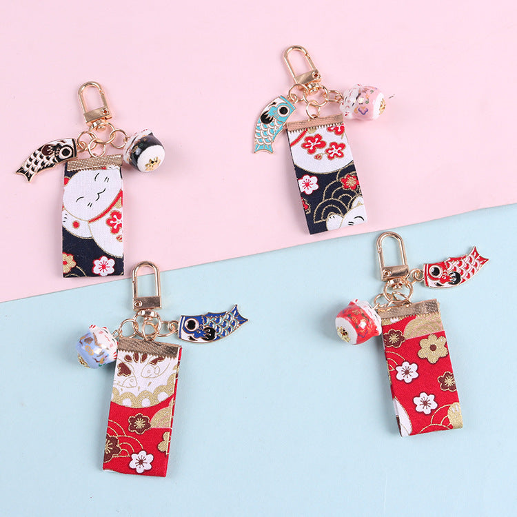Creative Ceramic Lucky Cat Keychain with Satin Fabric Tassel for New Year Gift Bag Car Charm